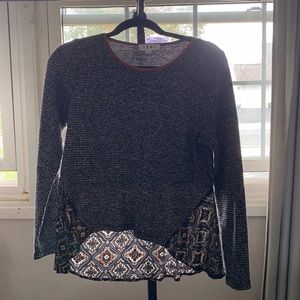 Grey long sleeve blouse with pattern detail on back